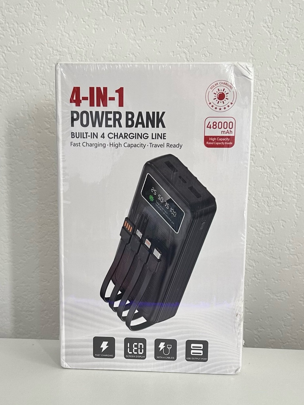 4-in-1 Black High Capacity Power Bank with Built-In Charging Cables - 48000mAh